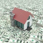 Little red modern 3D houses on the pile of money in isolated background. It is a real estate business.